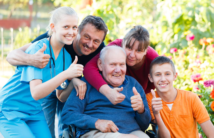 A happy family and their home health provider